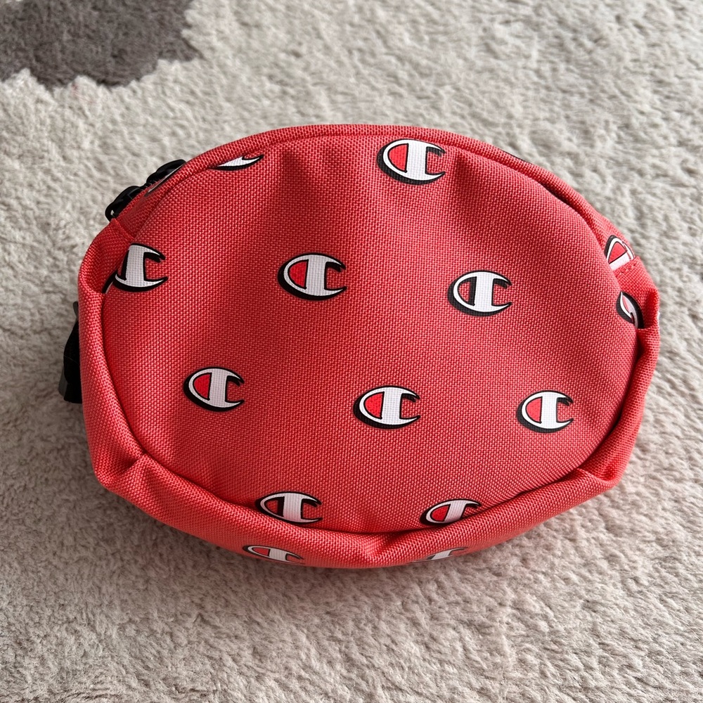 Champion Logo Waist Pack in Faded Red / Coral